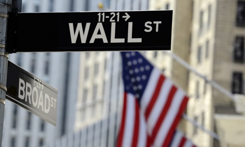 Wall Street and Broad Street signs in New York City.