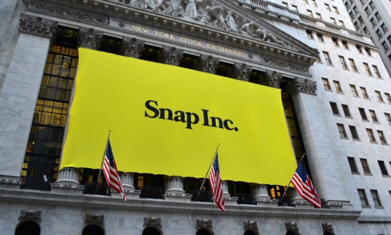 Snap Inc. banner covering the New York Stock Exchange facade during IPO debut, symbolizing the company's entry into public trading.