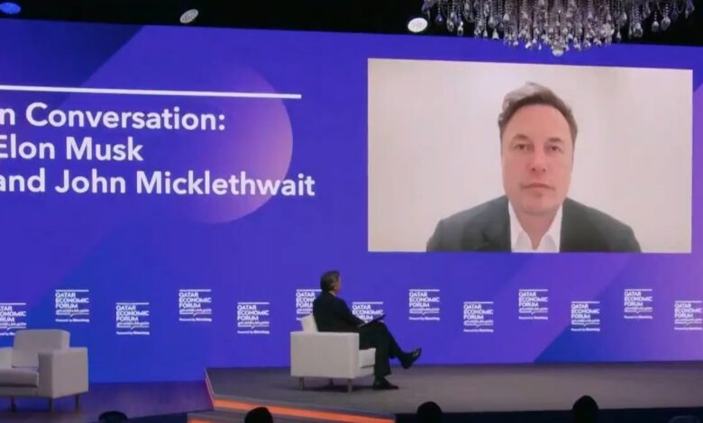 Screenshot of Elon Musk being interviewed on stage.