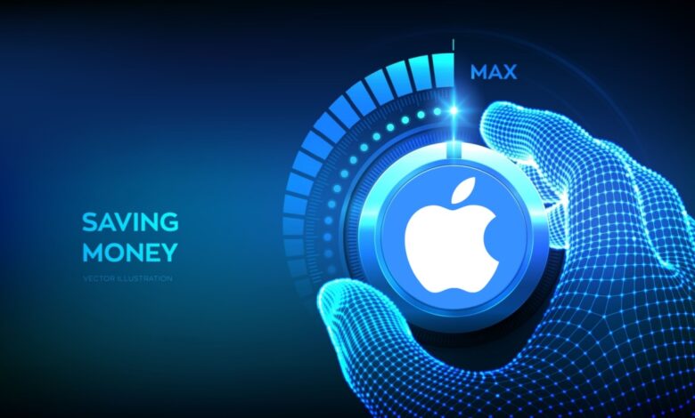 A futuristic digital illustration of a wireframe hand turning a large knob with the Apple logo at its center. The knob is surrounded by a glowing blue interface, and a gauge indicates it's set to "MAX." The words "SAVING MONEY" appear on the left side of the image in bright blue text. The design conveys the concept of maximizing savings with Apple-related products or services.