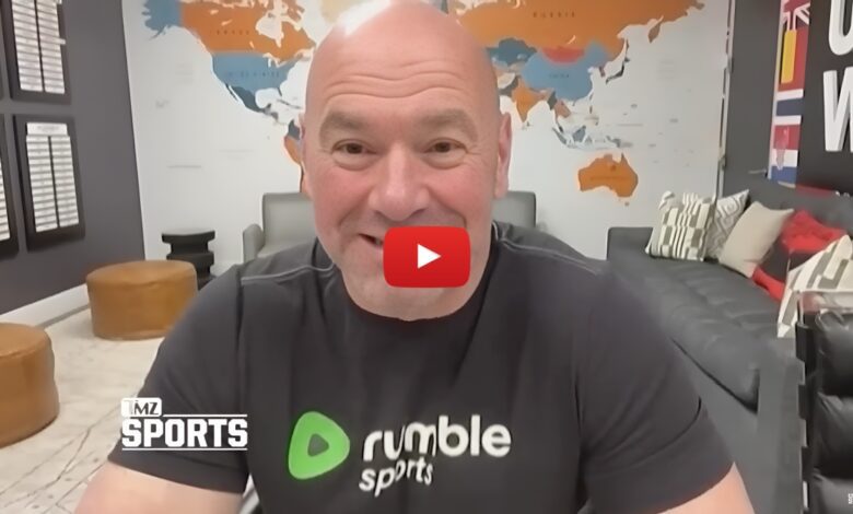 Dana White in a Rumble Sports t-shirt during a TMZ Sports interview, sitting in front of a world map and modern office decor.