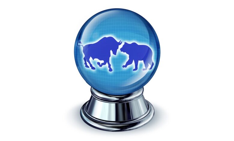 Crystal ball with bull and bear silhouettes symbolizing stock market predictions, investment trends, and market volatility forecasting.