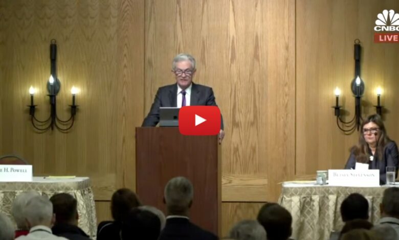 Federal Reserve Chair Jerome Powell speaking at an economic policy event, live-streamed by CNBC, with audience and panelist Betsey Stevenson in attendance.