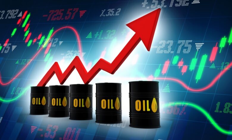Oil barrels with red up arrow and stock chart in the background.