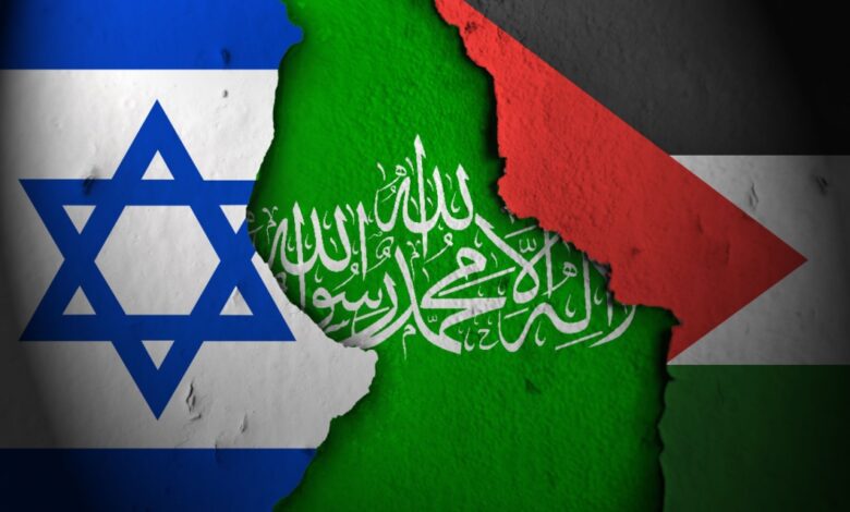 Torn Israel and Hamas flags side by side.