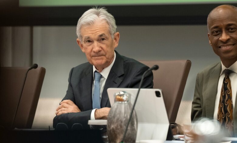 Federal Reserve Chair Jerome Powell Vice Chair Philip Jefferson sit at a boardroom table during a Federal Open Market Committee meeting in Washington, D.C.