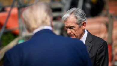 President Trump and Jerome Powell outside the Federal Reserve.