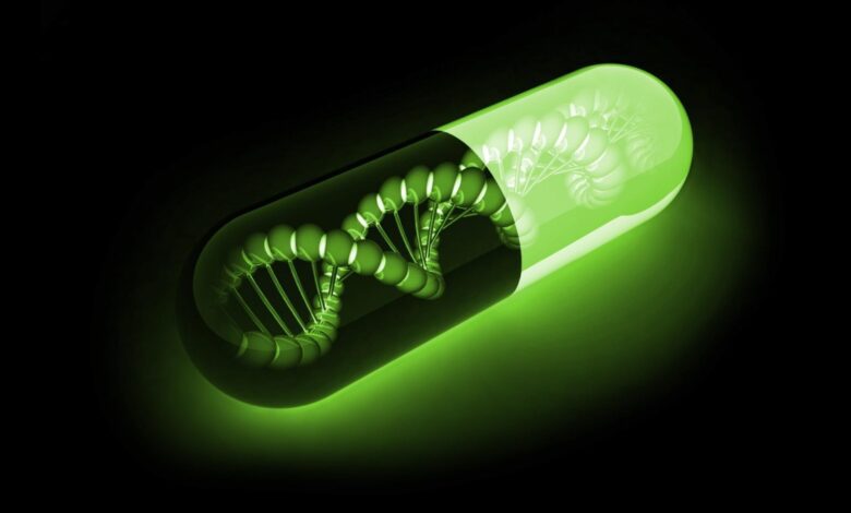 Black and green pill with dna inside.