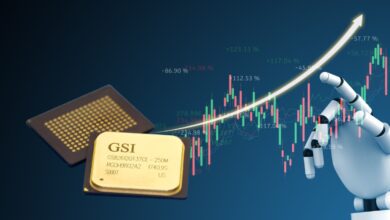 GSI Technology chip next to 3d illustration of A.I. machine hand pointing at stock chart.